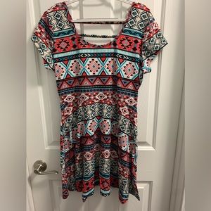 Bobbie brooks mini dress with adorable pattern and ladder style back